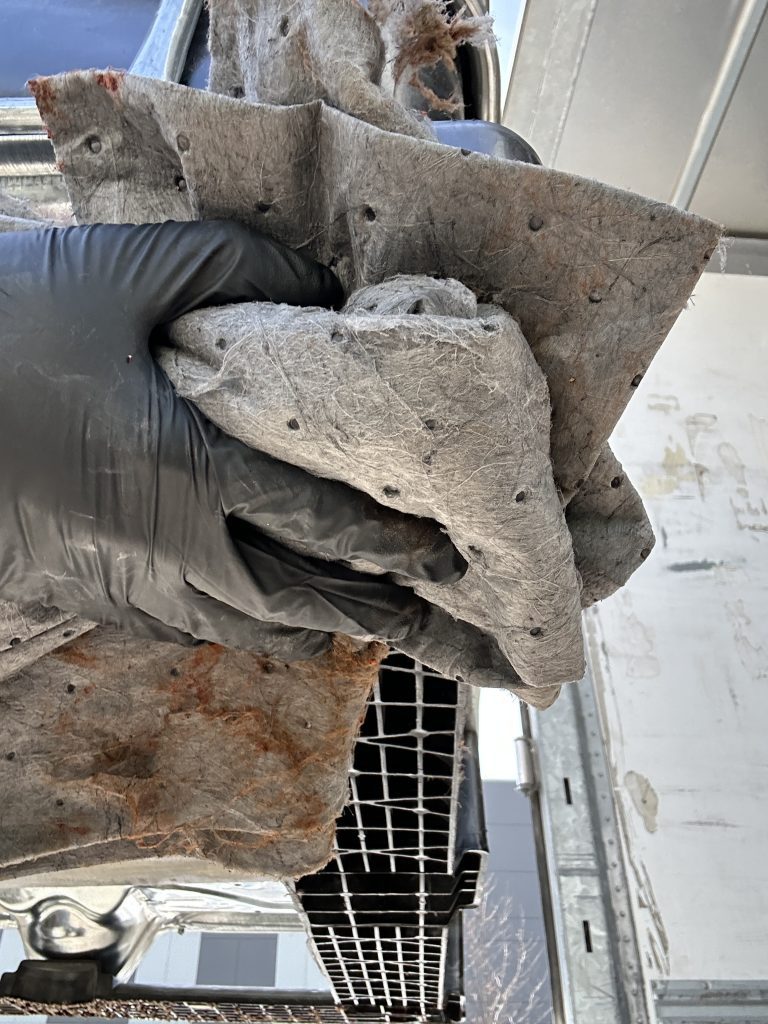 absorbent pads used for spill clean up of damaged freight