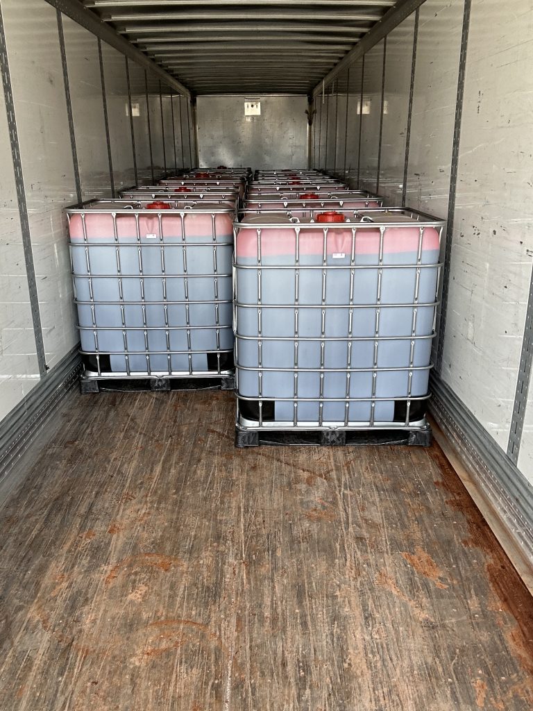 loading totes onto remediated trailer