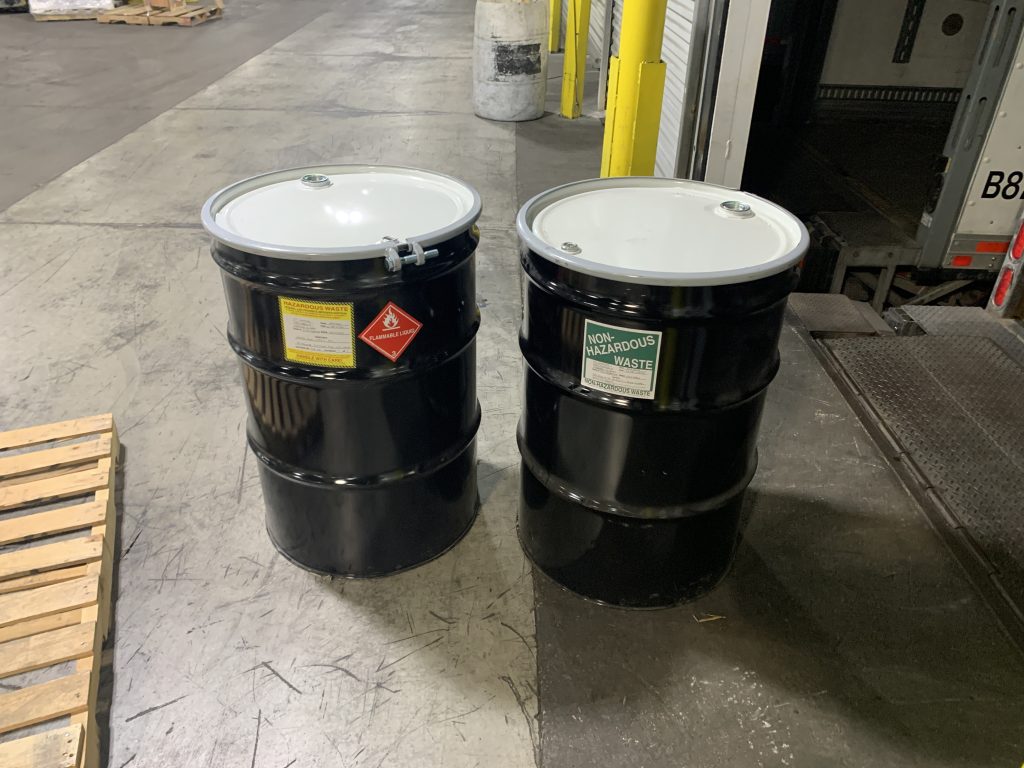 aste drums after hazmat spill cleanup and remediation